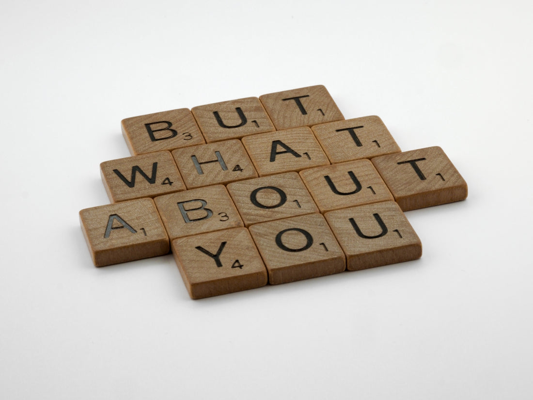 four scrabble tiles spelling out the words but what about you?